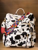 Black Cow Print Backpack with Guitar Strap